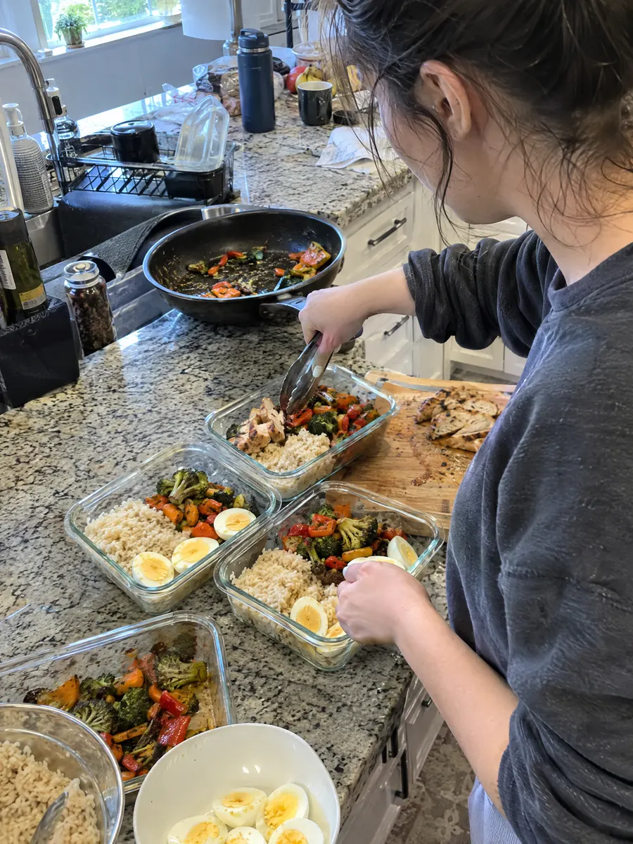 Portioning protein-first meals into containers